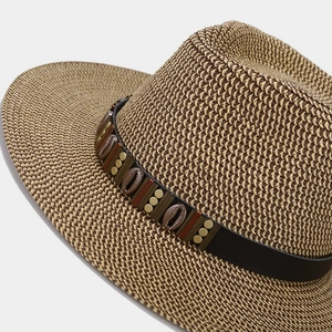 Classic straw Panama hat in brown weave with seashell and gold stud leather band