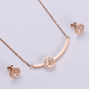 Detailed view of rose gold hollow tree of life necklace and stud earrings jewelry set
