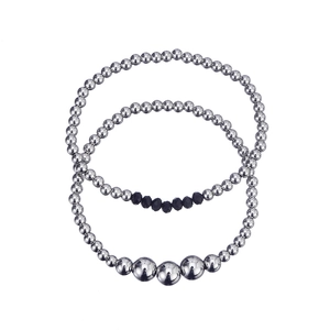 Waterproof stainless steel bead bracelet set with black faceted crystals on white background