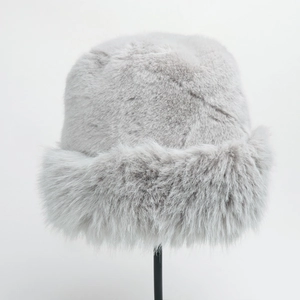 Detailed view of the thick gray plush faux fur texture on the winter bucket hat