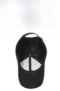 Detailed interior of the black baseball cap showing breathable mesh and lining structure