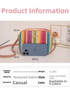 Detail view of woven rainbow crossbody bag dimensions 20x13x6cm and metal trim decoration