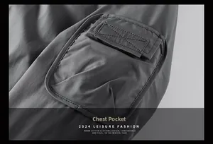 Close-up of utility sleeve pocket with flap and velcro on a thick winter flight jacket