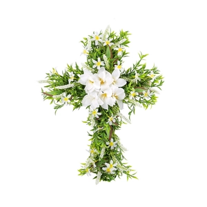 Easter decorative cross wreath with white flowers and green leaves on white background