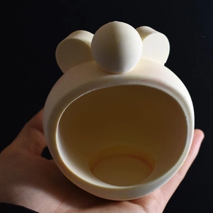 Detail of Mickey-shaped silicone mold for DIY aroma candle holder and plaster base