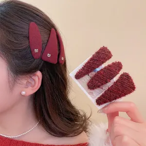 Vintage burgundy plush triangular hair clips with metallic B-logo for autumn winter style