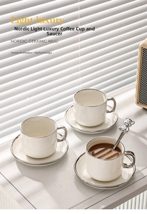 Detail of luxury ceramic coffee cups with silver bear relief spoon and elegant shadow