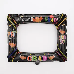 Detailed view of black aluminum foil graduation photo frame balloon with owl design