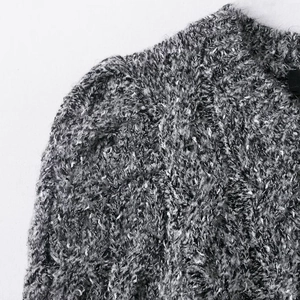 Close-up of mixed grey knit cardigan with round neck and button details on white background
