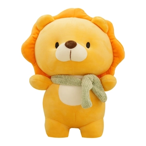 Cute plush lion doll with green knitted scarf for children gift on white background