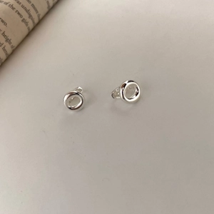 Minimalist silver S925 sterling silver hoop earrings set on clean artistic background