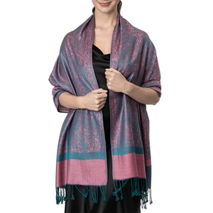 Close-up of pink and teal paisley jacquard shawl with soft cashmere feel and fringe detail