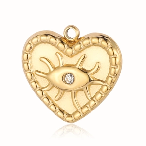 Close-up of golden heart evil eye pendant with clear gemstone and beaded edge details