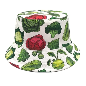 Close-up of cotton bucket hat with realistic vegetable prints and reinforced stitching
