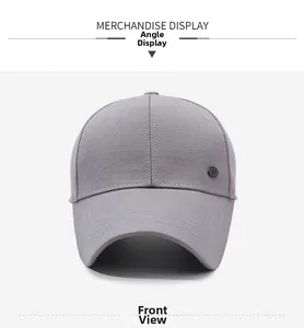 Front view of grey baseball cap showing detailed fabric texture and metal badge