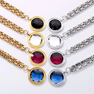 Detailed grid of crystal necklaces with round faceted stones and thick box chains