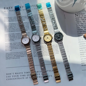 Close-up of elegant ladies' steel strap quartz watches in gold, rose gold and silver