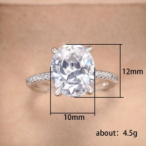 Elegant oval zirconia engagement ring in silver tone with micro-paved side stones