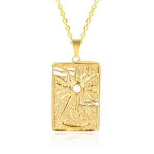 Macro shot of gold sun tarot pendant with embossed rays and hammered texture detail