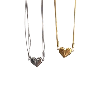 Minimalist heart pendant necklaces in gold and silver finish with sleek snake chains