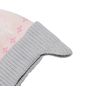 Close-up of pink and grey winter knit hat featuring jacquard pattern and ribbed cuff detail