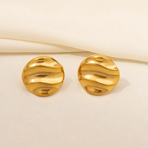 Detail of 18k gold plated 304 stainless steel earrings with irregular wavy texture