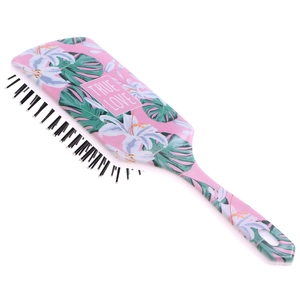 Detail of pink floral air cushion hairbrush featuring True Love text and white flowers