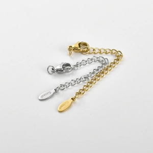 Detail of 18k gold and silver stainless steel extender chains with lobster clasps