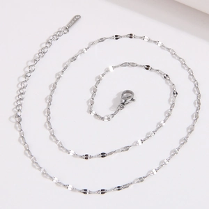 Minimalist silver stainless steel lip necklace with adjustable chain and S.STEEL tag