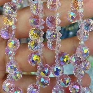 Detail of pink faceted crystal glass beads with AB coating for jewelry making