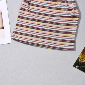 Detail of colorful striped knit fabric texture with pink, orange and yellow stripes
