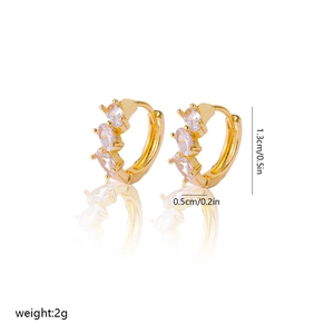 Detailed view of gold hoop earrings featuring marquise-cut cubic zirconia in 1.3cm size