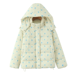 Close-up of winter hooded jacket with blue floral pattern and zipper snap closure