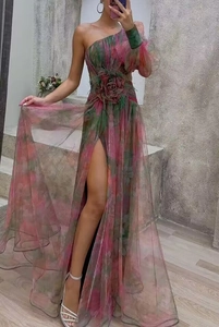 Detail of pink and green floral one-shoulder dress with 3D flower and high slit