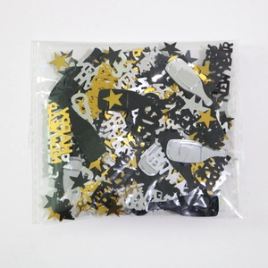 Confettis de fête en forme d'étoiles et bouteilles de champagne or et argent en sac