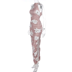 Detail view of pink floral dress with side drawstring ruched texture and high slit design