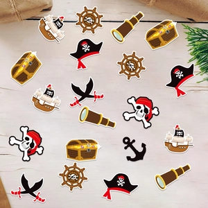 Pirate theme party confetti decorations with pirate ship, treasure chest and skull designs