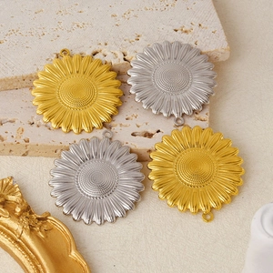 Detailed view of 304 stainless steel sunflower flower pendants in gold and silver finishes
