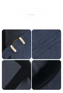 Detail of blue denim cap featuring bronze metal buckle and precise white stitching