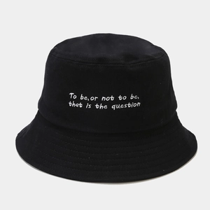 Detail of embroidered Shakespeare quote on black cotton canvas bucket hat