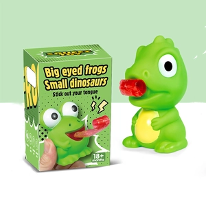 Big eyed frog squeeze toy showing the stick out your tongue feature and packaging box