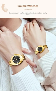 Detail shot of golden quartz couple watches with black rhinestone dials on wrist