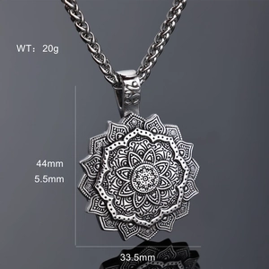 Macro shot of Viking mandala pendant with 44mm height and 20g weight measurement