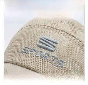 Detailed close-up of the breathable mesh fabric and SPORTS embroidery on a summer cap