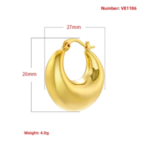 Detailed view of chunky golden hoop earrings with 27mm diameter and polished finish