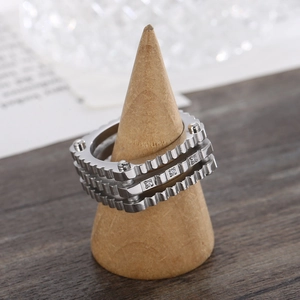 Three-layer industrial gear ring in silver steel with sparkling white gemstone inlay