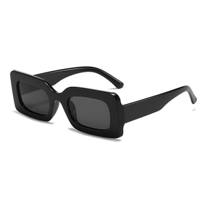 Classic black rectangular sunglasses with vintage wide frame and dark lenses