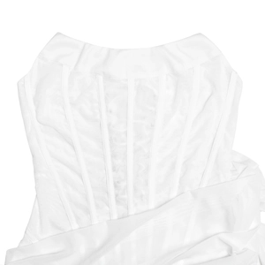 Detail of white mesh corset dress featuring structured boning and sheer fabric texture
