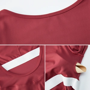 Long sleeve dark red yoga bodysuit with white back straps and removable padding