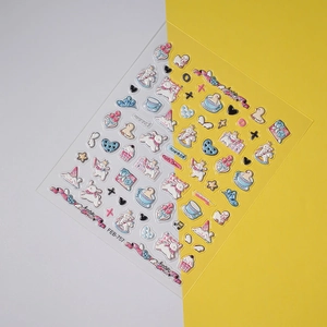 Detailed view of 5D embossed cartoon nail stickers featuring rabbits and rainbows